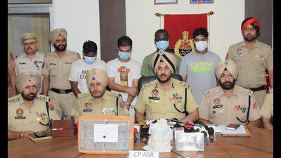 Police commissioner Gurpreet Singh Bhullar briefing media after the arrest of Nigerian national with two local accused in Amritsar, India on Monday. (HT Photo)