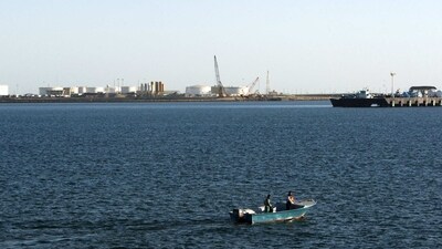 A speed boat passes by oil docks at the port of Kalantari in the city of Chabahar, east of the Strait of Hormuz. (Reuters File) A speed boat passes by oil docks at the port of Kalantari in the city of Chabahar, east of the Strait of Hormuz. (Reuters File)