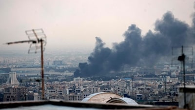 Smoke billows from an explosion near the Azadi Tower in Tehran on June 16, 2025 after Israeli strikes. The Islamic Republic of Iran Broadcasting (IRIB) building was struck in an Israeli attack on Monday, cutting live coverage immediately. (AFP) Smoke billows from an explosion near the Azadi Tower in Tehran on June 16, 2025 after Israeli strikes. The Islamic Republic of Iran Broadcasting (IRIB) building was struck in an Israeli attack on Monday, cutting live coverage immediately. (AFP)