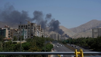 Iran Israel war news live updates: Smoke rises from an oil storage facility after it was struck by an Israeli strike in Tehran (AP) Iran Israel war news live updates: Smoke rises from an oil storage facility after it was struck by an Israeli strike in Tehran (AP)