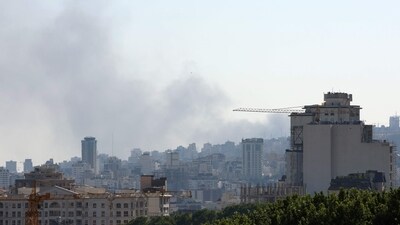 Smoke plumes arise from the Islamic Republic of Iran Broadcasting (IRIB) corporation building in the north of Tehran after it was hit by an overnight Israeli strike (AFP) Smoke plumes arise from the Islamic Republic of Iran Broadcasting (IRIB) corporation building in the north of Tehran after it was hit by an overnight Israeli strike (AFP)