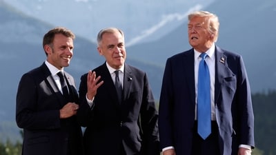 French President Emmanuel Macron with Canada's Prime Minister Mark Carney and U.S. President Donald Trump at the G7 Summit (AP) French President Emmanuel Macron with Canada's Prime Minister Mark Carney and U.S. President Donald Trump at the G7 Summit (AP)