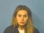 Christina Formella (mugshot in pic), a former teacher, faces 55 charges.