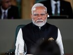 Prime Minister Narendra Modi listens while attending a meeting chaired by Canada's Prime Minister Mark Carney, not seen, with world leaders and invited guests during the G7 Summit in Kananaskis, Alberta, Tuesday, June 17, 2025. 