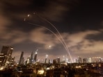 Iran Israel war news live updates: Israeli air defence systems are activated to intercept Iranian missiles over the Israeli city of Tel Aviv early on June 18, 2025. Iran Israel war news live updates: Israeli air defence systems are activated to intercept Iranian missiles over the Israeli city of Tel Aviv early on June 18, 2025.