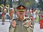 Newly elevated Field Marshal General Asim Munir prays after laying wreath on the Martyrs monument during a special guard of honour ceremony at General Headquarters in Rawalpindi, Pakistan, Newly elevated Field Marshal General Asim Munir prays after laying wreath on the Martyrs monument during a special guard of honour ceremony at General Headquarters in Rawalpindi, Pakistan,