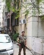 Security personnel seen stationed outside an office where an ED raid was conducted on Wednesday. (Sanchit Khanna/Hindustan Times) Security personnel seen stationed outside an office where an ED raid was conducted on Wednesday. (Sanchit Khanna/Hindustan Times)