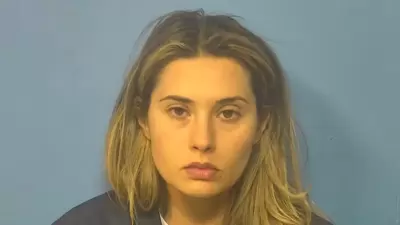 Christina Formella (mugshot in pic), a former teacher, faces 55 charges. (DuPage County State's Attorney's Office)