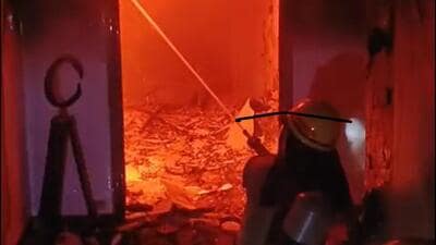 A purported video of the incident also surfaced on social media, showing huge flames inside the room as firefighters worked to douse the fire using hose pipes. (HT Photos) A purported video of the incident also surfaced on social media, showing huge flames inside the room as firefighters worked to douse the fire using hose pipes. (HT Photos)