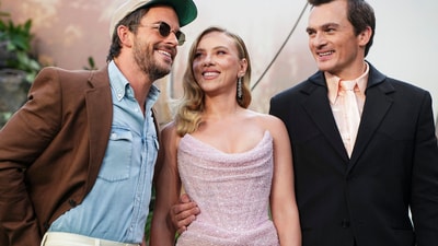 Jonathan Bailey, from left, Scarlett Johansson, and Rupert Friend. For Rupert Friend, who also plays one of the specialists, this installment in the franchise is exhilarating."I love adventure. I love being taken on a ride where you don't know what's going to happen. I love the unknown. I love risk," he said. (Scott A Garfitt/Invision/AP) Jonathan Bailey, from left, Scarlett Johansson, and Rupert Friend. For Rupert Friend, who also plays one of the specialists, this installment in the franchise is exhilarating."I love adventure. I love being taken on a ride where you don't know what's going to happen. I love the unknown. I love risk," he said. (Scott A Garfitt/Invision/AP)