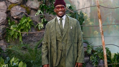 Mahershala Ali poses for photographers. Jurassic World: Rebirth, directed by Gareth Edwards, follows a team of specialists that embarks on an expedition to a forbidden island, home to a research facility for the original "Jurassic Park". (Millie Turner/Invision/AP) Mahershala Ali poses for photographers. Jurassic World: Rebirth, directed by Gareth Edwards, follows a team of specialists that embarks on an expedition to a forbidden island, home to a research facility for the original "Jurassic Park". (Millie Turner/Invision/AP)