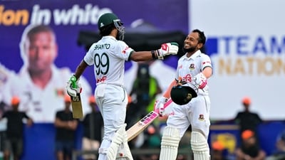 Mushfiqur Rahim (R) celebrates after scoring a century (100 runs) with captain Najmul Hossain Shanto during the first day of the first Test cricket match between Sri Lanka and Bangladesh (AFP) Mushfiqur Rahim (R) celebrates after scoring a century (100 runs) with captain Najmul Hossain Shanto during the first day of the first Test cricket match between Sri Lanka and Bangladesh (AFP)