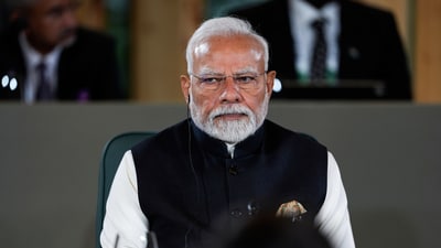 Prime Minister Narendra Modi listens while attending a meeting chaired by Canada's Prime Minister Mark Carney, not seen, with world leaders and invited guests during the G7 Summit in Kananaskis, Alberta, Tuesday, June 17, 2025. (AP) Prime Minister Narendra Modi listens while attending a meeting chaired by Canada's Prime Minister Mark Carney, not seen, with world leaders and invited guests during the G7 Summit in Kananaskis, Alberta, Tuesday, June 17, 2025. (AP)
