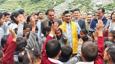 Chief minister Sukhvinder Singh Sukhu interacting with students during his visit of Government Senior Secondary School, Baga Sarahan, in Nirmand sub division of Kullu district on Wednesday. (HT Photo)