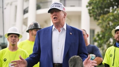 President Donald Trump speaks as a flag pole is installed on the South Lawn of the White House, Wednesday, June 18, 2025, in Washington. (AP) President Donald Trump speaks as a flag pole is installed on the South Lawn of the White House, Wednesday, June 18, 2025, in Washington. (AP)