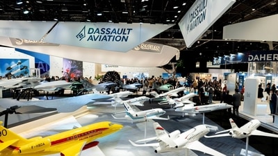 Display models of Dassault Aviation SA aircraft, including Falcon firefighter and executive jets at the Paris Air Show in Paris, France. (Bloomberg file) Display models of Dassault Aviation SA aircraft, including Falcon firefighter and executive jets at the Paris Air Show in Paris, France. (Bloomberg file)