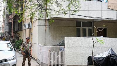 Security personnel seen stationed outside an office where an ED raid was conducted on Wednesday. (Sanchit Khanna/Hindustan Times) Security personnel seen stationed outside an office where an ED raid was conducted on Wednesday. (Sanchit Khanna/Hindustan Times)