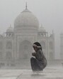 A child enjoying the rain at the Taj Mahal in Agra. (PTI) A child enjoying the rain at the Taj Mahal in Agra. (PTI)