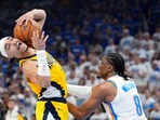 Indiana Pacers guard Andrew Nembhard (2) in action against Oklahoma City Thunder forward Jalen Williams (8) during the second quarter of game five of the 2025 NBA Finals at Paycom Center. 
