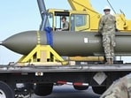 In this photo released by the U.S. Air Force on May 2, 2023, airmen look at a GBU-57, or the Massive Ordnance Penetrator bomb, at Whiteman Air Base in Missouri In this photo released by the U.S. Air Force on May 2, 2023, airmen look at a GBU-57, or the Massive Ordnance Penetrator bomb, at Whiteman Air Base in Missouri