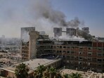 Smokes raises from a building of the Soroka hospital complex after it was hit by a missile fired from Iran in Beersheba, Israel, Thursday, June 19, 2025.