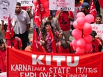 Members of various trade unions take part in a rally in Bengaluru on May 1, 2025. Members of various trade unions take part in a rally in Bengaluru on May 1, 2025.