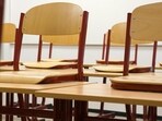 A Nigerian university drew criticism as staff were seen touching students to check for bras before exams.