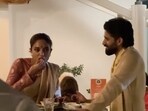 Naga Chaitanya looks smitten by wife Sobhita Dhulipala even as she gorges on Akhil Akkineni's wedding feast.