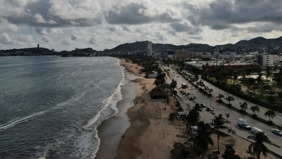 Mexican President Claudia Sheinbaum urged people to avoid going out and advised those living in low-lying areas or near rivers to move to shelters. (AP) Mexican President Claudia Sheinbaum urged people to avoid going out and advised those living in low-lying areas or near rivers to move to shelters. (AP)
