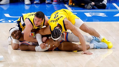 Oklahoma City Thunder guard Shai Gilgeous-Alexander (2) grabs a loose ball as Indiana Pacers guard T.J. McConnell (9) and guard Andrew Nembhard (2) battle for control during the third quarter in game five of the 2025 NBA Finals at Paycom Center. (IMAGN IMAGES via Reuters Connect)