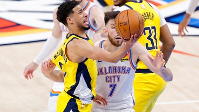 Indiana Pacers guard Tyrese Haliburton (0) drives to the basket past Oklahoma City Thunder forward Chet Holmgren (7) during the fourth quarter in game five of the 2025 NBA Finals at Paycom Center. (IMAGN IMAGES via Reuters Connect)