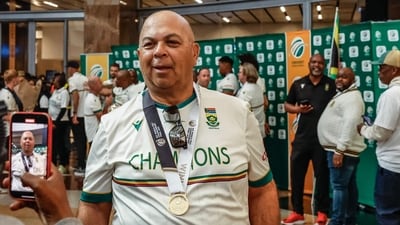 Proteas Test Coach Shukri Conrad reacts upon arriving with the rest of the team at the O.R. Tambo International Airport in Kempton Park (AFP) Proteas Test Coach Shukri Conrad reacts upon arriving with the rest of the team at the O.R. Tambo International Airport in Kempton Park (AFP)
