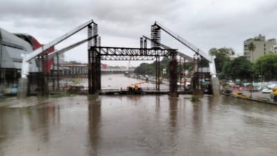 Continuous heavy rainfall in the catchment areas has led to a steady rise in water levels, prompting the irrigation department to increase the discharge from the Khadakwasla dam into the Mutha River. (MAHENDRA KOLE/HT PHOTO)