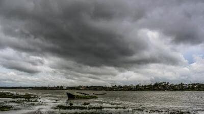 Dark monsoon clouds fill the sky above the River Hooghly in Nadia, West Bengal. (PTI) Dark monsoon clouds fill the sky above the River Hooghly in Nadia, West Bengal. (PTI)
