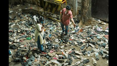 Footwears on the ground outside the Chinnaswamy Stadium following a stampede after a large number of fans gathered for the felicitation of IPL 2025 winning Royal Challengers Bengaluru team, on June 4 (PTI) Footwears on the ground outside the Chinnaswamy Stadium following a stampede after a large number of fans gathered for the felicitation of IPL 2025 winning Royal Challengers Bengaluru team, on June 4 (PTI)