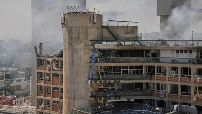 Smokes raises from a building of the Soroka hospital complex after it was hit by a missile fired from Iran in Be'er Sheva, Israel (AP) Smokes raises from a building of the Soroka hospital complex after it was hit by a missile fired from Iran in Be'er Sheva, Israel (AP)