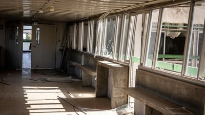A heavily destroyed and burned passageway is at a building in Soroka Hospital after it was struck by an Iranian missile. (AFP) A heavily destroyed and burned passageway is at a building in Soroka Hospital after it was struck by an Iranian missile. (AFP)