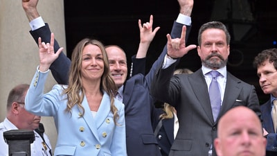 Karen Read's trial has seen supporters using an ASL gesture for 'I love you' to show solidarity. (AP Photo/Josh Reynolds) (AP)
