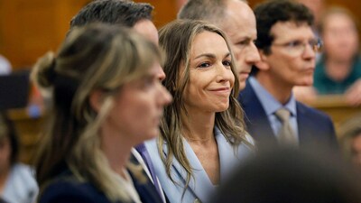 Karen Read smiles as the not guilty verdict is read during her trial at Norfolk Superior Court in Dedham, Massachusetts, U.S. June 18, 2025. (via REUTERS)