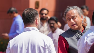Congress MPs Rahul Gandhi and Shashi Tharoor during the Budget session of Parliament in New Delhi. (PTI file) Congress MPs Rahul Gandhi and Shashi Tharoor during the Budget session of Parliament in New Delhi. (PTI file)