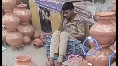Screen grab from the viral video in which the SI was seen falling inside a pottery shop. (Sourced)
