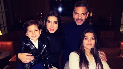 Sunjay Kapur with his wife Priya and their kids. Sunjay Kapur with his wife Priya and their kids.
