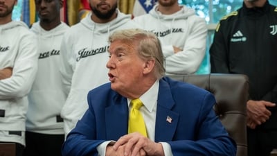 US President Donald Trump, center, during a meeting with members of the Juventus soccer club in the Oval Office of the White House in Washington, DC, US, on Wednesday, June 18, 2025. (Bloomberg) US President Donald Trump, center, during a meeting with members of the Juventus soccer club in the Oval Office of the White House in Washington, DC, US, on Wednesday, June 18, 2025. (Bloomberg)