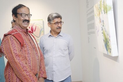 Prof Rakesh Chandra and Atul Hundoo Prof Rakesh Chandra and Atul Hundoo