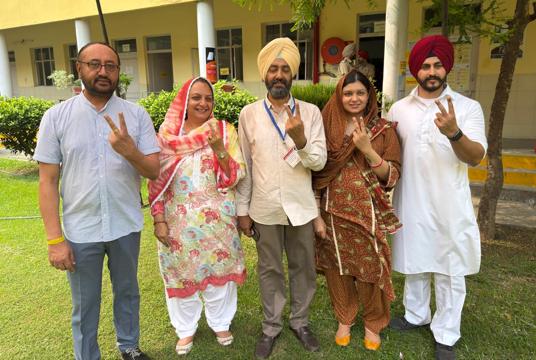 Shiromani Akali Dal candidate Parupkar Singh Ghuman (centre) with his family after voting on Thursday. (HT Photo) Shiromani Akali Dal candidate Parupkar Singh Ghuman (centre) with his family after voting on Thursday. (HT Photo)