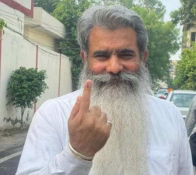 Congress candidate and former minister Bharat Bhushan Ashu after voting on Thursday. (HT Photo) Congress candidate and former minister Bharat Bhushan Ashu after voting on Thursday. (HT Photo)
