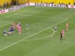 Lionel Messi scores a free-kick vs Porto. Lionel Messi scores a free-kick vs Porto.
