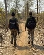 District Reserve Guard personnel patrol in Bastar division of Chhattisgarh. (AFP) District Reserve Guard personnel patrol in Bastar division of Chhattisgarh. (AFP)