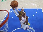 Oklahoma City Thunder guard Shai Gilgeous-Alexander (2) shoots against Indiana Pacers guard Andrew Nembhard (2) during game five of the 2025 NBA Finals at Paycom Center.