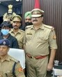 The arrested gang members under police custody (HT Photo) The arrested gang members under police custody (HT Photo)